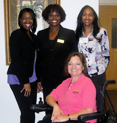 Some of the happy organizers of the Hillsborough County Financial Fitness Fair pose for a photo. Standing, from left, Anika Coney, Hillsborough County Prosperity Campaign, Glorie Singleton and Valerie Reed-Martin of APD. Seated, Sandra Sroka, Hillsborough County ADA Liaison