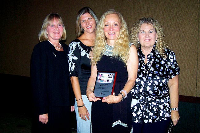 Residential Designer Elaine Terner receives a United Cerebral Palsy 2010 Community Award on June 8 for her work in designing home modifications for people with disabilities. From left, Ella Schutt, Shelley Hoffman, Terner, and Bonnie Rosenberg