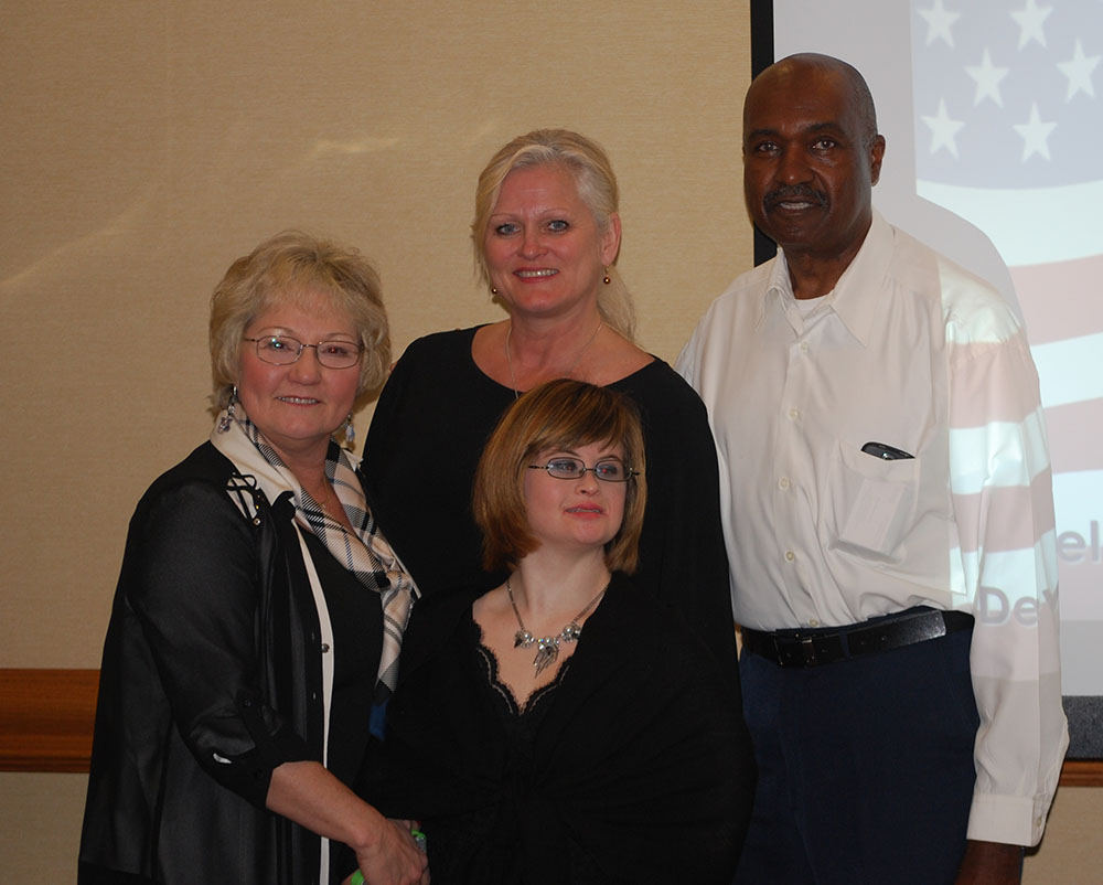 Front: Cameron Northup, Rita Little
Back:  Tara Crawford Potter, Victor Smith
They are Project Empower Board Members
