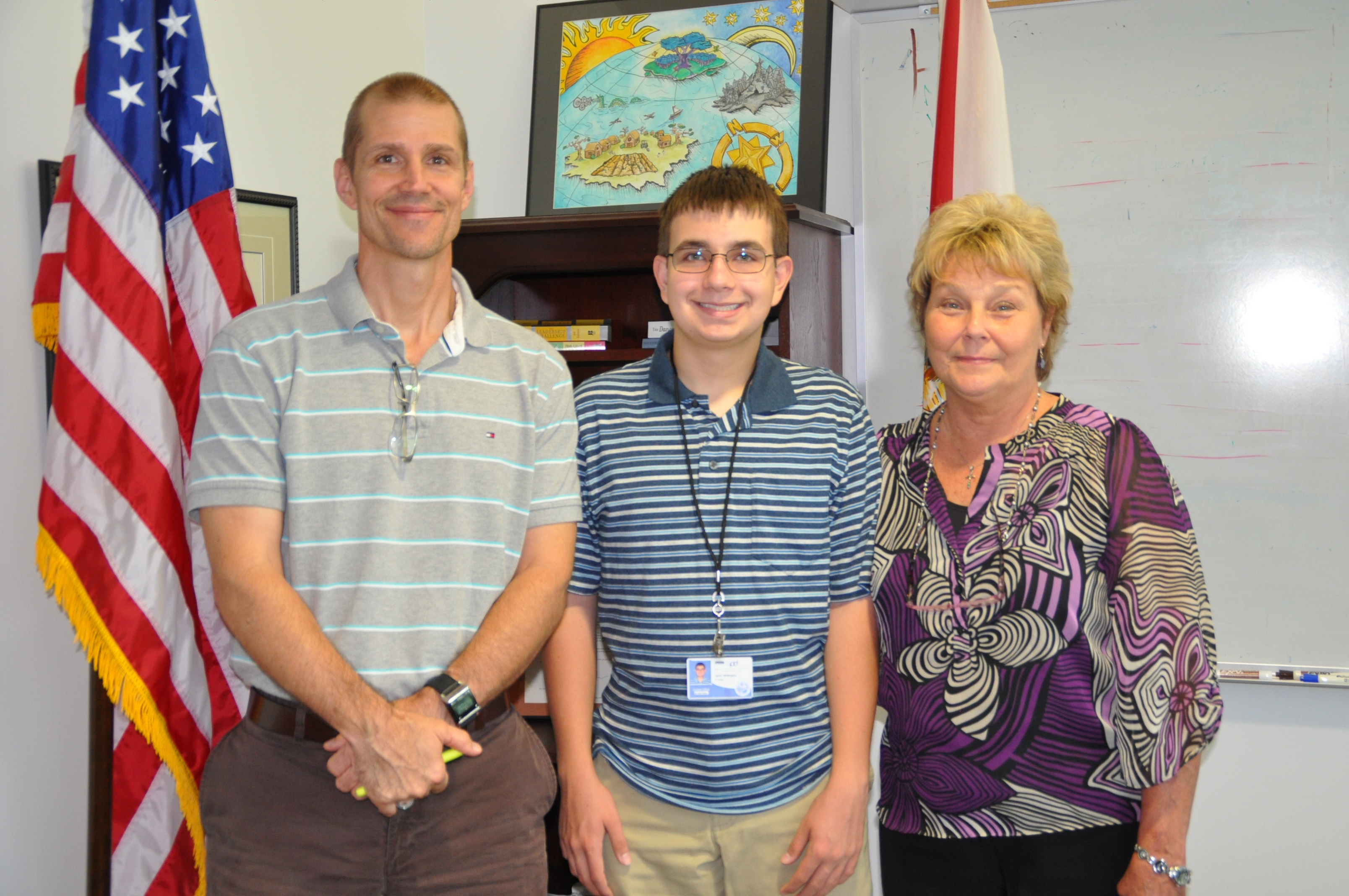 Chief Information Officer Mark Ervin, APD Intern Jacob Whittington and Executive Director Barbara Palmer.