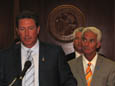 Autism advocate and football legend Dan Marino speaks at the bill signing ceremony for the Window of Opportunity act.  Governor Crist looks on