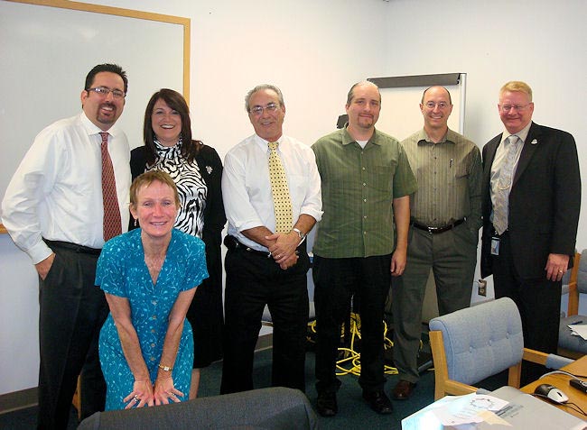 From left, Peter Karlan, Sheila Wilson, Tina Herzik, Steve Palumbo, Jose Pinto, Wayne Olsen , and Arthur Barndt celebrate the success of their training session